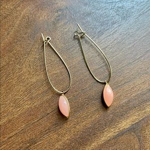 Gold hoop earrings with peach tear drops